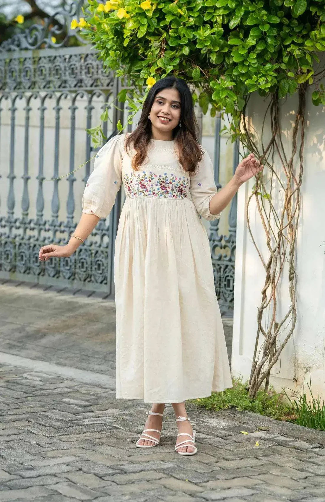 Off-white cotton midi dress with floral embroidery and crochet lace detailing - Eraya Main image